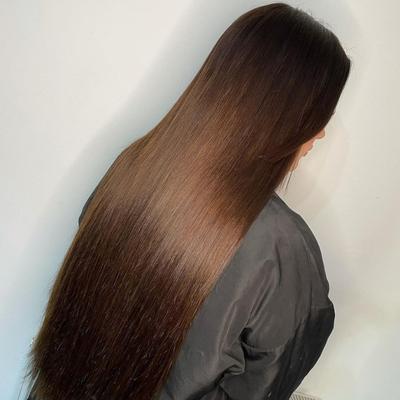 customer using tape-in hair extension