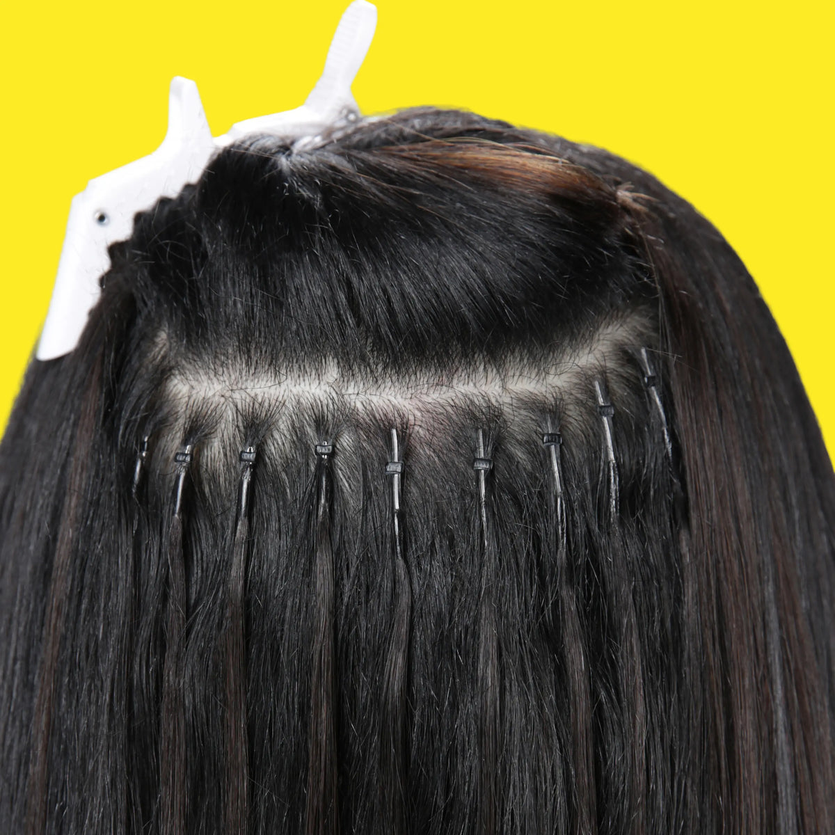 Jet Black (#1) Remy Royale Nano Bond Hair Extensions in use